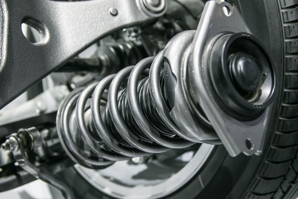 A Close Up Of A Shock Absorber On A Car — Banora Automotive In Tweed Heads South, NSW