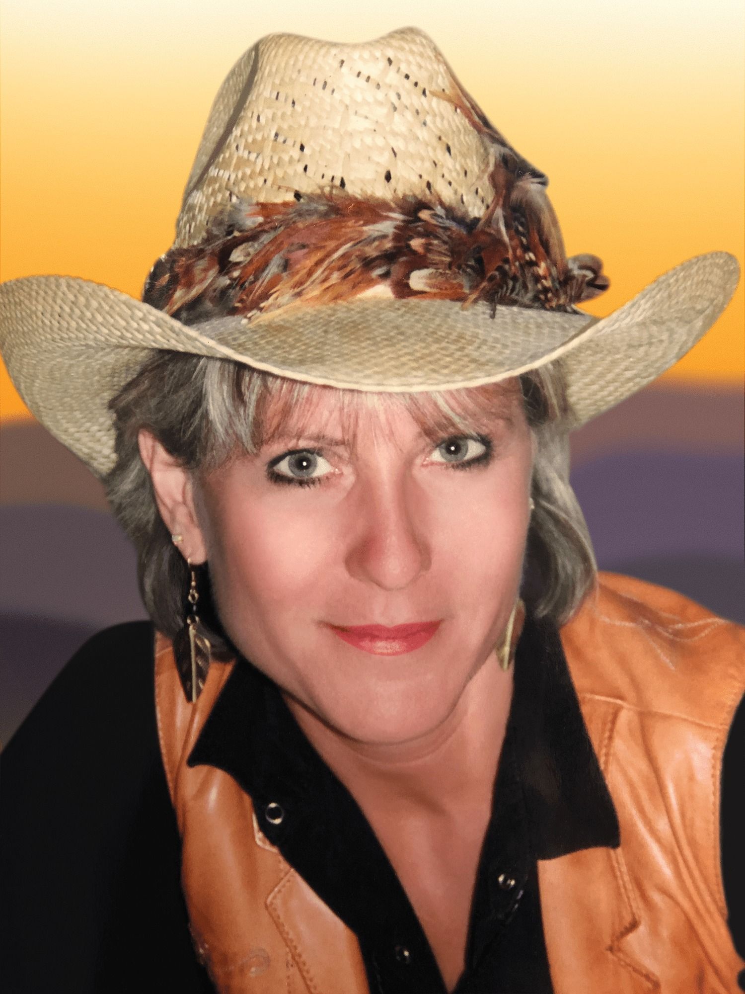 A woman wearing a cowboy hat and a leather vest
