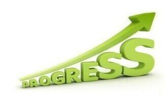 Green arrow slanting upward showing progress