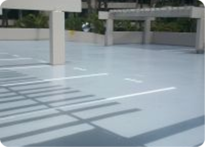 Empty light blue patio with bench shadows and white columns