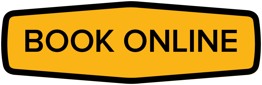 A yellow sign that says `` book online '' on a white background.