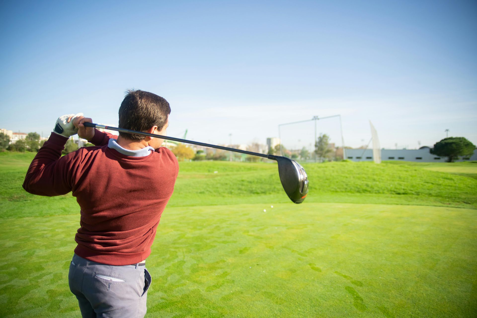 Golfer hitting a great drive