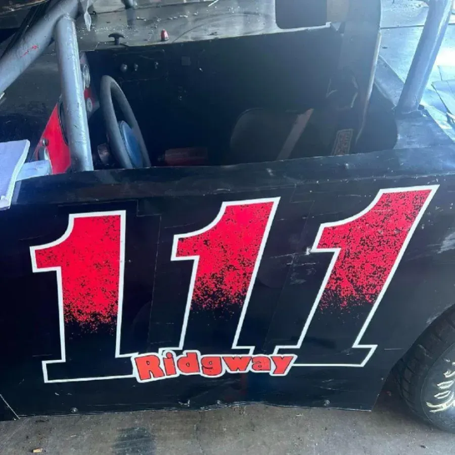 Race car numbers and sponsor lettering