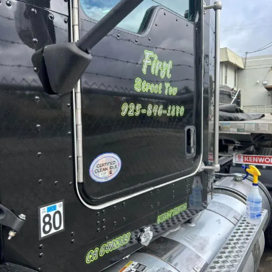 Tow truck door with DOT numbering