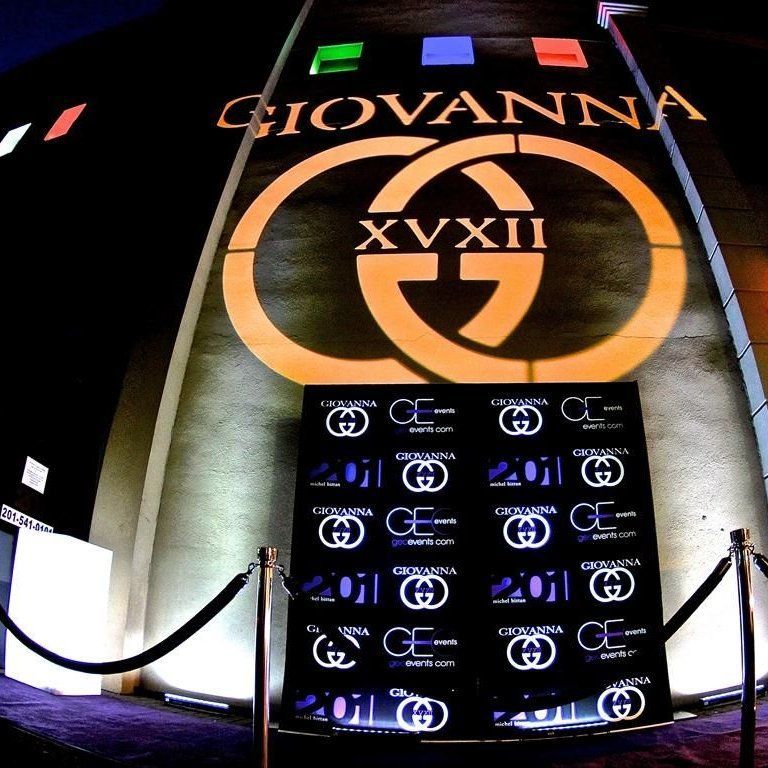 Giovanna Sweet 16 logo projection and red carpet step-and-repeat