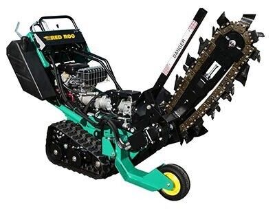 Green and black tracked trencher digging into the ground.