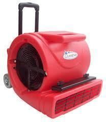 Red commercial carpet dryer with handle, wheels, and vent.