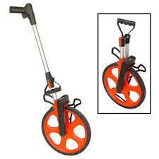 Orange and black distance measuring wheel, with a telescoping handle.