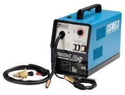 Blue Cigweld Transmig 135 MIG welder with handle, cables, and a control panel.