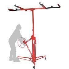 Red drywall lift with person silhouette operating it.