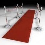 Red carpet with rope barriers.