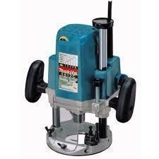 Makita plunge router, teal and gray, with black handles, ready for woodworking.