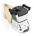 Floor sander with dust bag, silver, black handles, ready for sanding.
