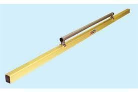 Yellow concrete screed with a handle, used to level wet concrete.