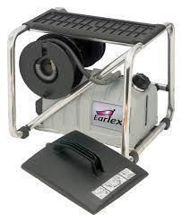 Earlex paint sprayer in metal frame with black handle and hose.