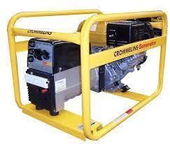 Yellow Crommelins generator in a protective yellow frame; black and silver engine and control panel visible.