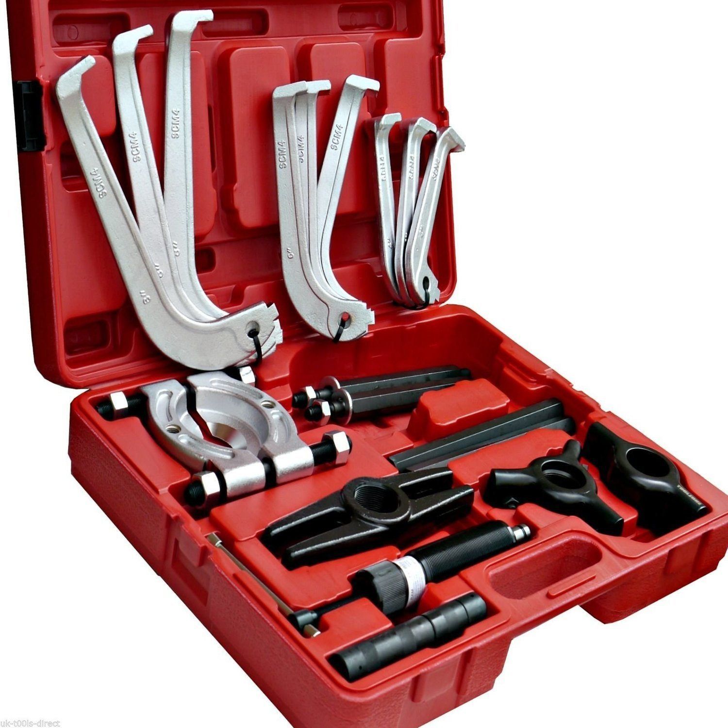 A red toolbox with various car spring compressor tools, mostly silver and black.