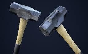 Two sledgehammers with black heads and wooden handles on dark background.