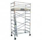 A silver metal scaffolding tower with a platform and ladder, on wheels.