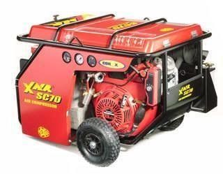 Red X-Air SC70 air compressor with a gas engine, gauge display, and black wheels.