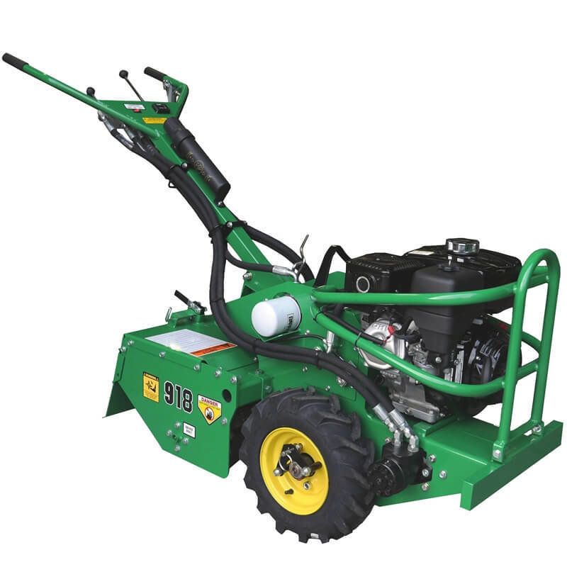 Green and yellow garden tiller, Model 916, with black handlebars, a gas tank, and large rear tire.