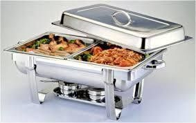 Stainless steel chafing dish with food, ready for serving.