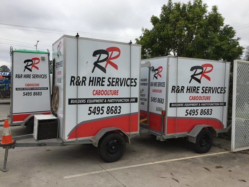 Three white trailers with 