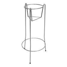 Silver metal plant stand with a circular base and a triangular bracket holding a pot.