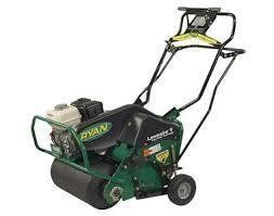 Green Ryan LawnAire IV aerator machine.