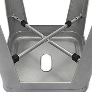 Underside of a metal chair with crossed support bars and black rubber feet.
