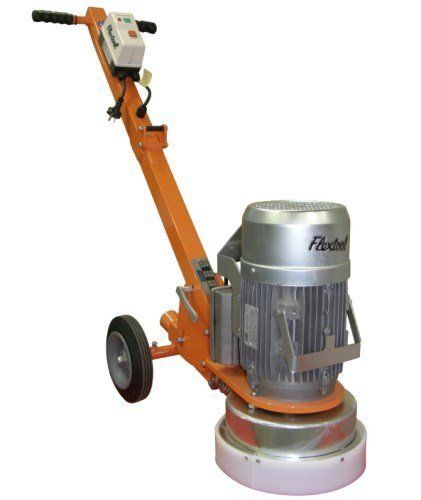 Orange and silver floor grinder machine with handle and wheels.