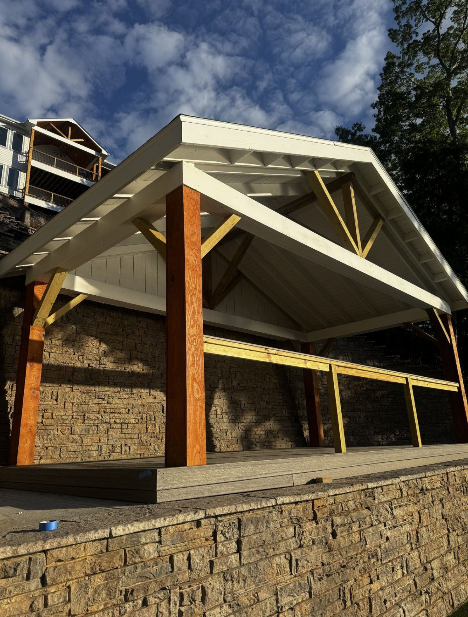 Exterior of a building with a white and wood framed structure