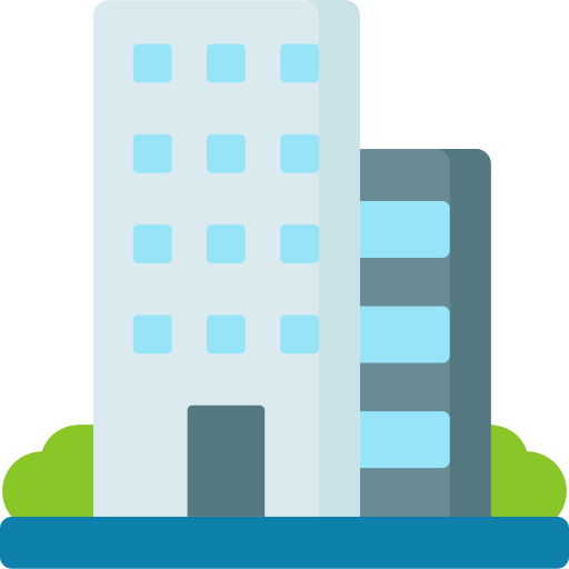 Office buildings with blue windows and green bushes.