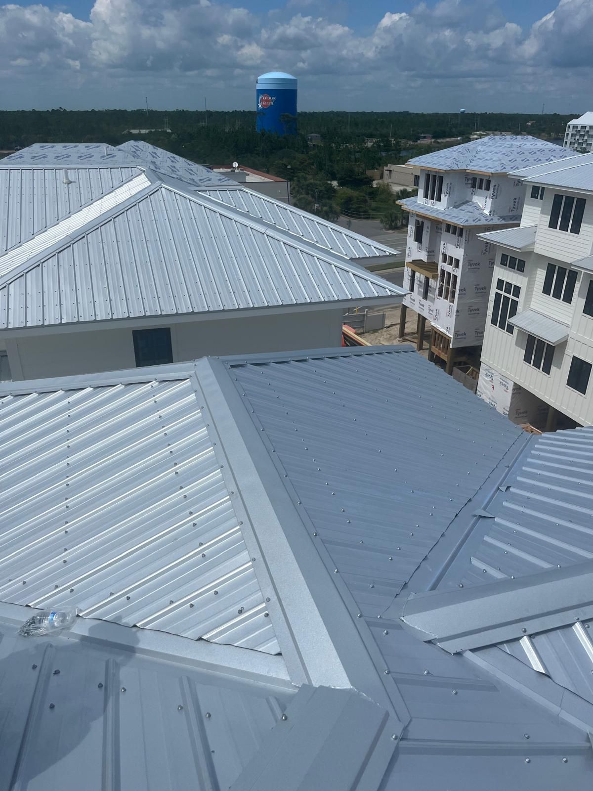 D-Rib exposed fastener metal roof installation Pensacola FL — Coastal Family Roofing