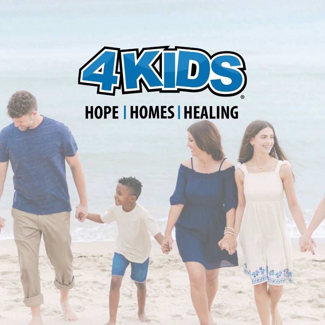 Family holding hands walking on a beach with logo: 4Kids.  "Hope, Homes, Healing".
