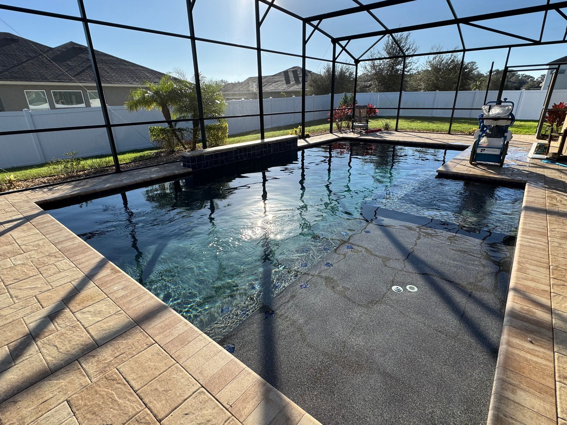 A person is standing in front of a hot tub.