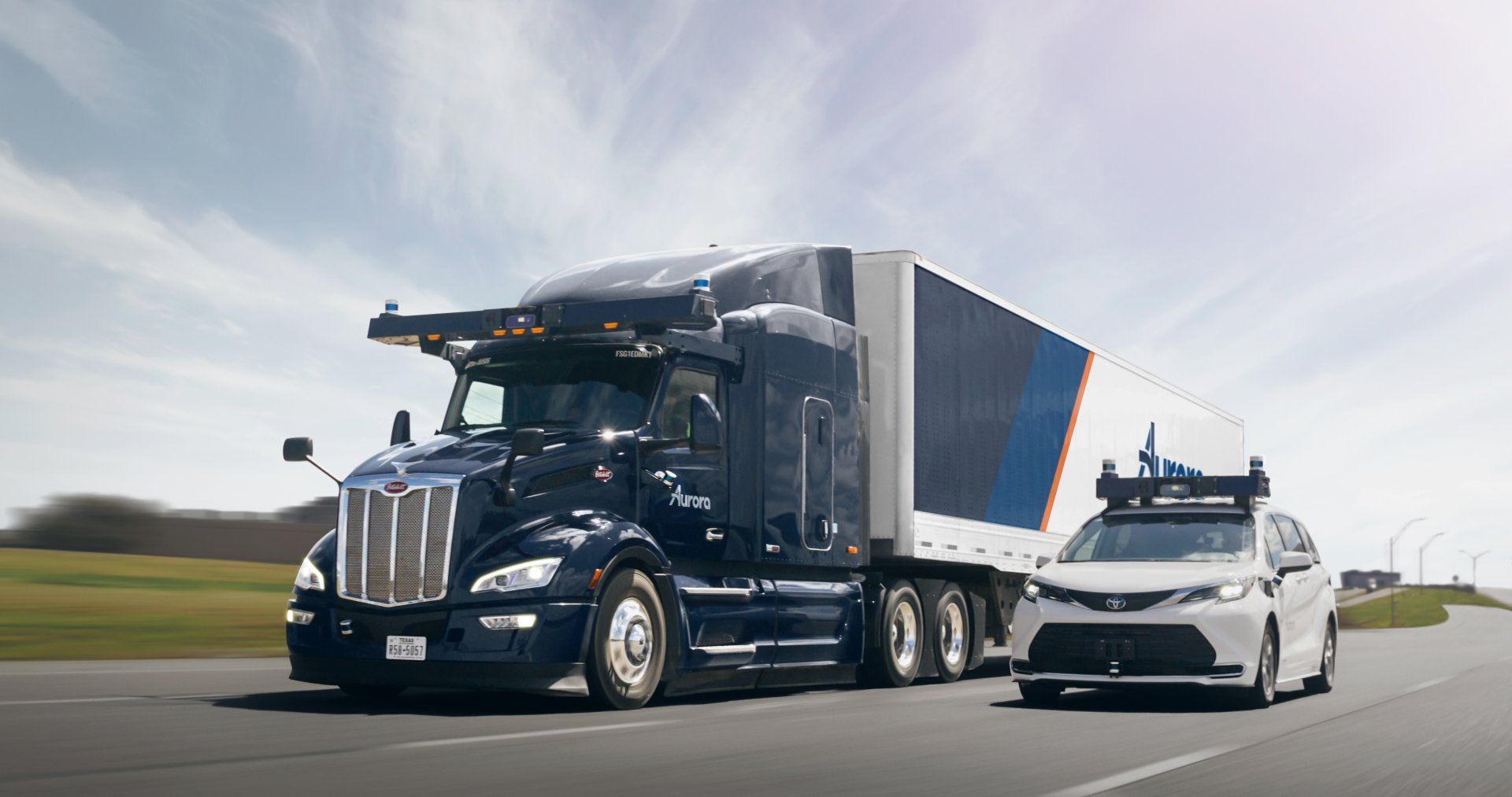 Dark blue semi-truck and white car with sensors on highway.