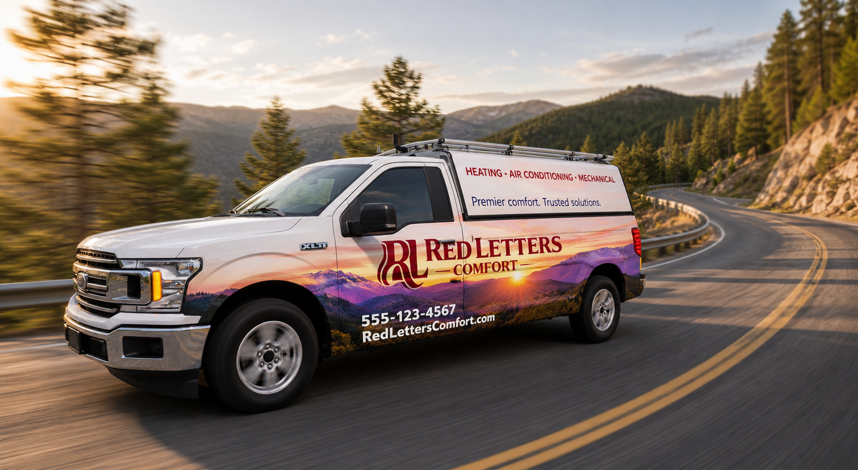 Red Lifters tow truck on a mountain road at sunset, with trees and rocky hills in the background