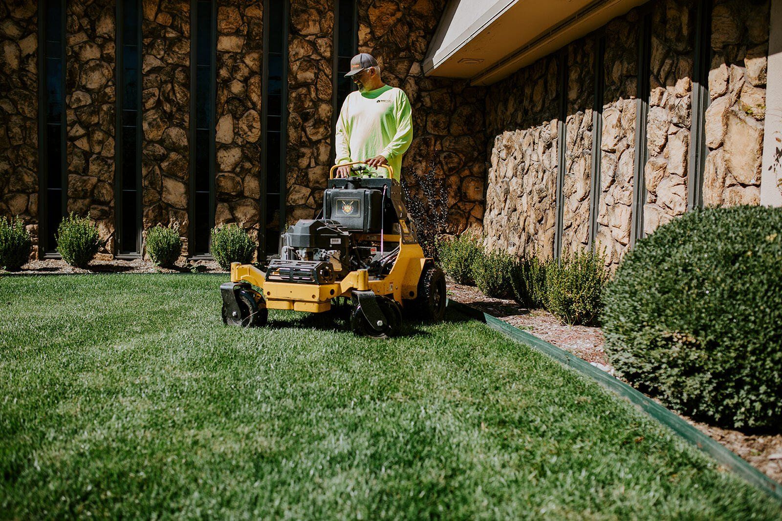 Man Riding a Lawn Mower