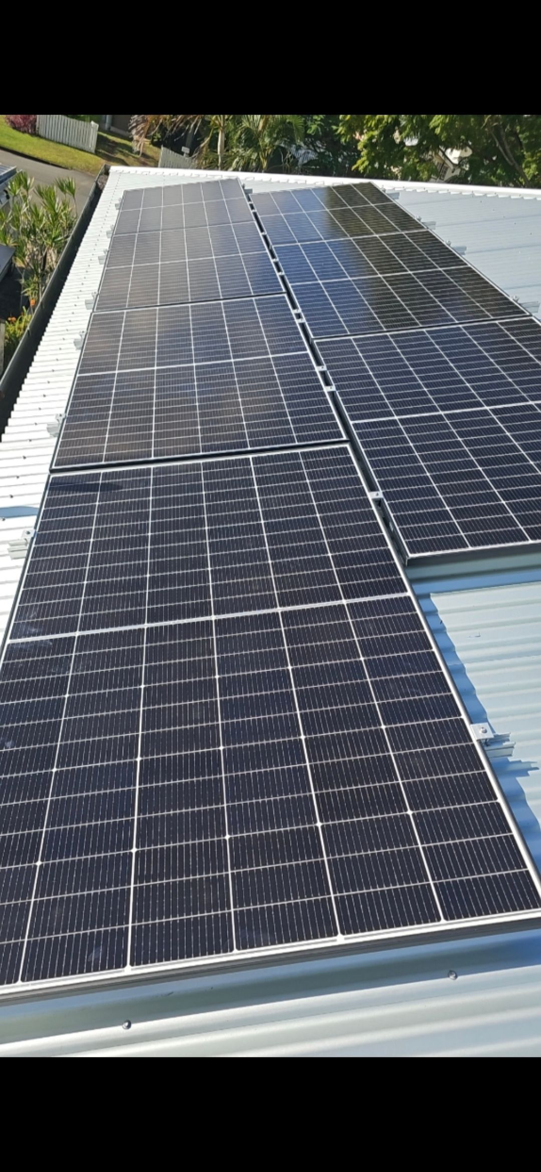 Solar panels installed on a rooftop — Watkins Electrical In Pialba, QLD