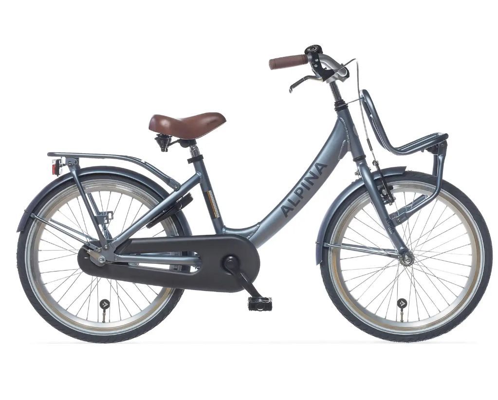 Een roze fiets van Volare met een voordrager op een witte achtergrond.