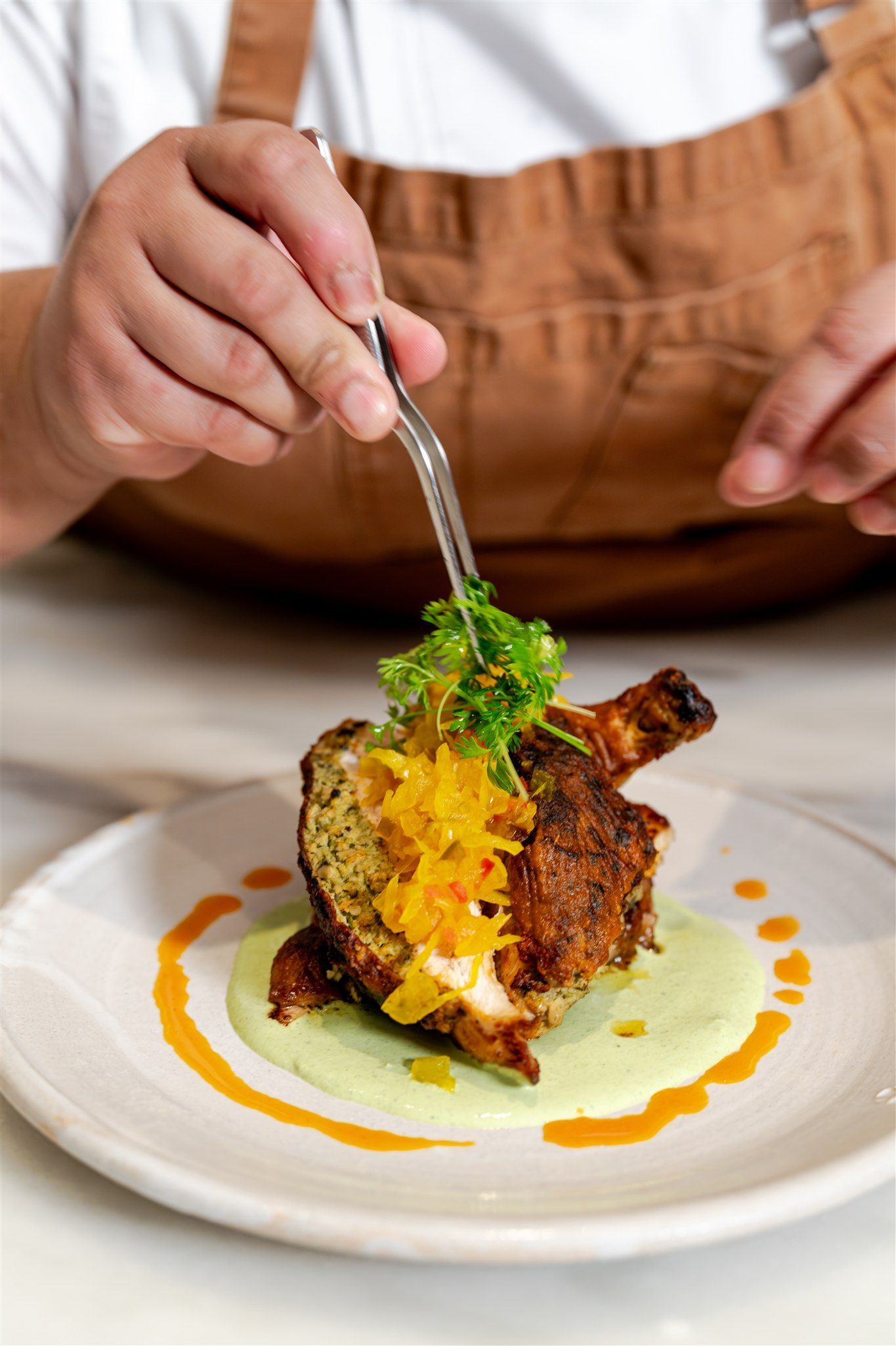 Chef plating food
