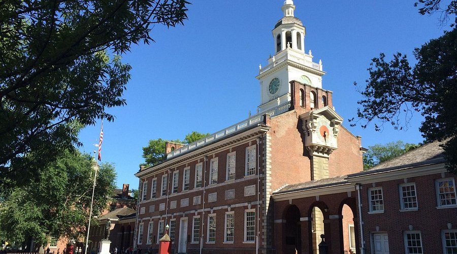 A large brick building with a clock tower on top of it