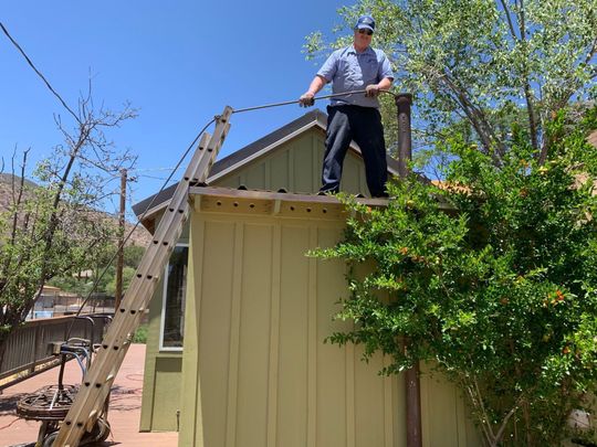 Plumber Going Down The Sewer Hole — Sierra Vista, AZ — Roto Rooter Sewer and Drains