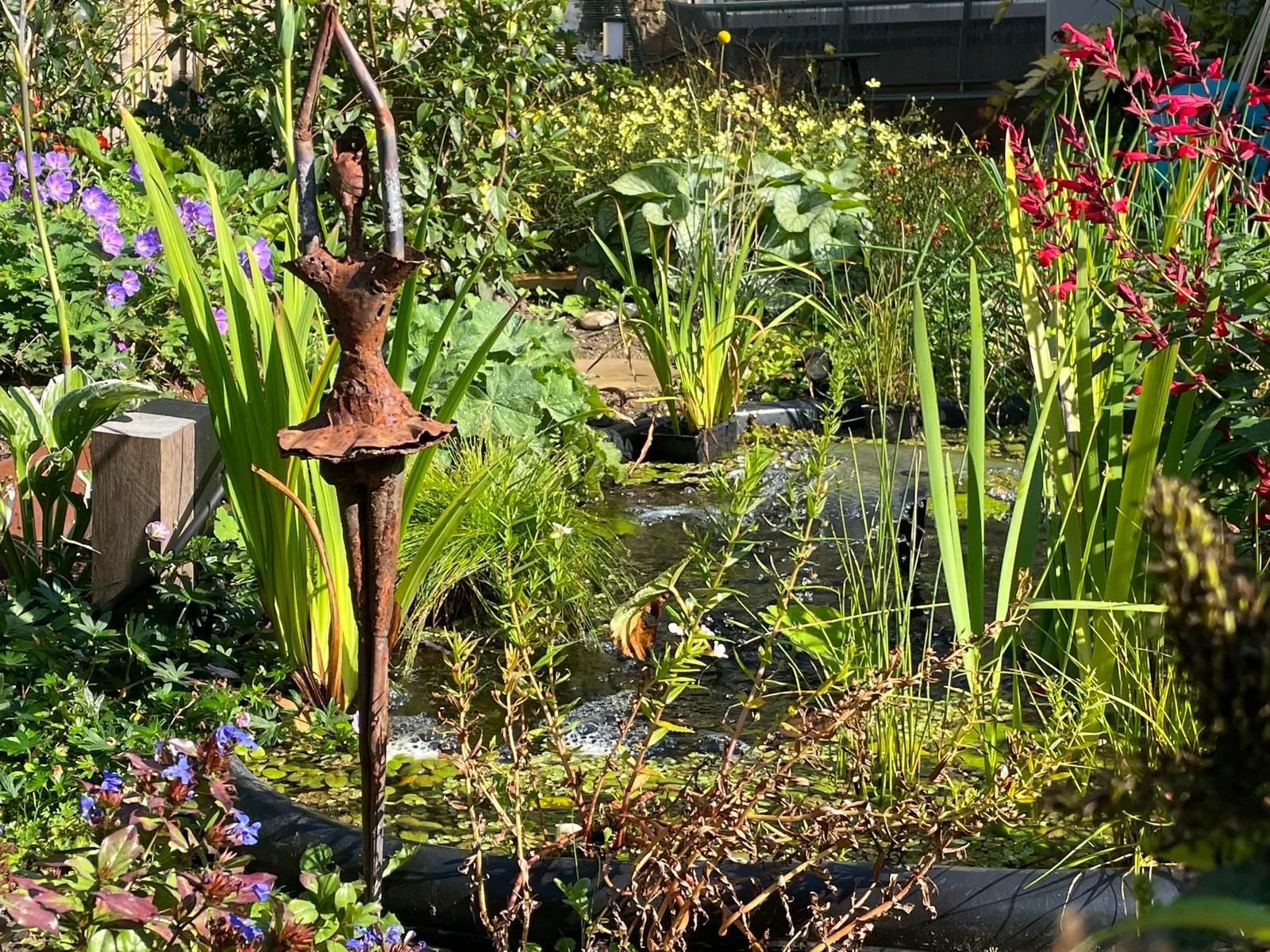 Vijver in achtertuin Malden