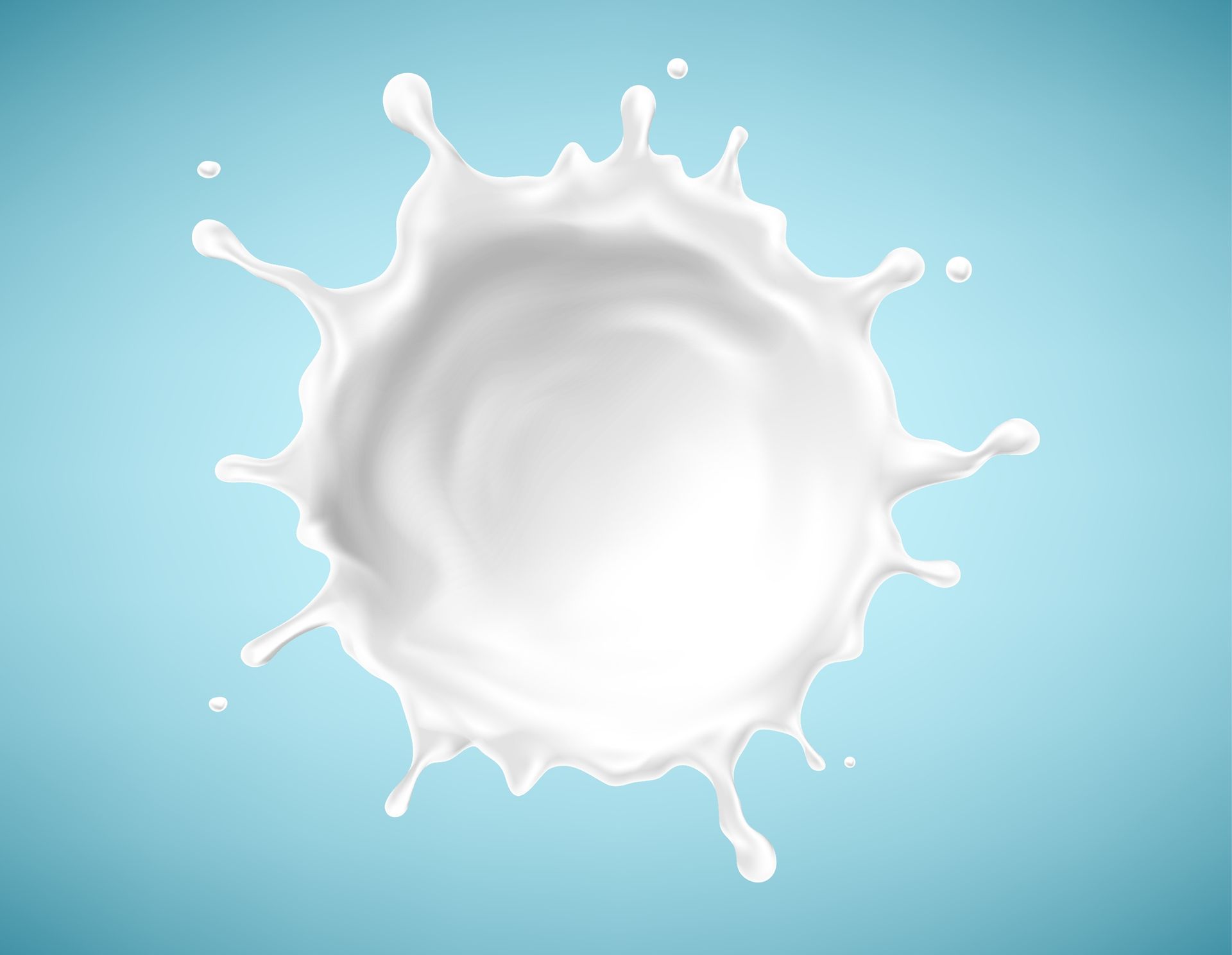 A splash of milk on a blue background.