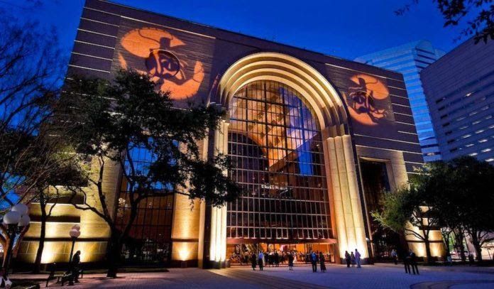 A large building is lit up at night