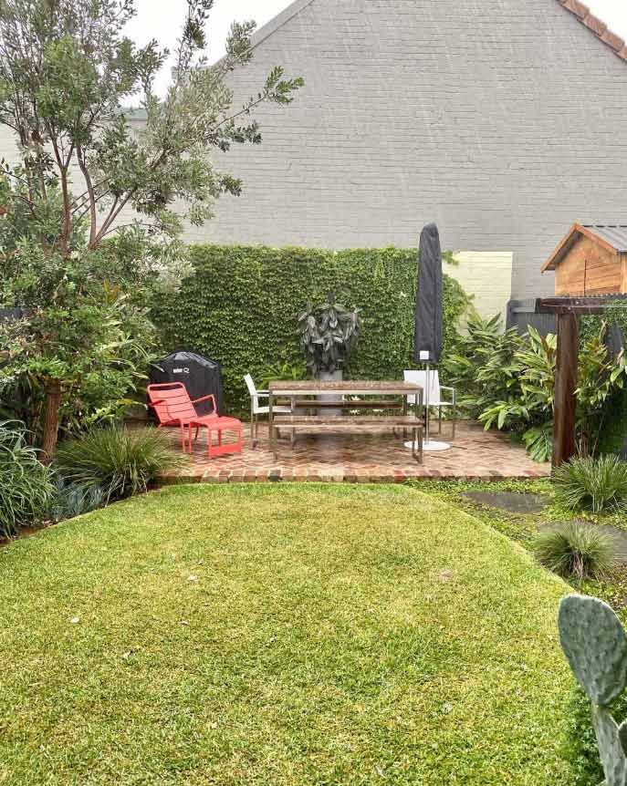 A Backyard With A Table And Chairs In It — Garden Folk In Alstonville, NSW