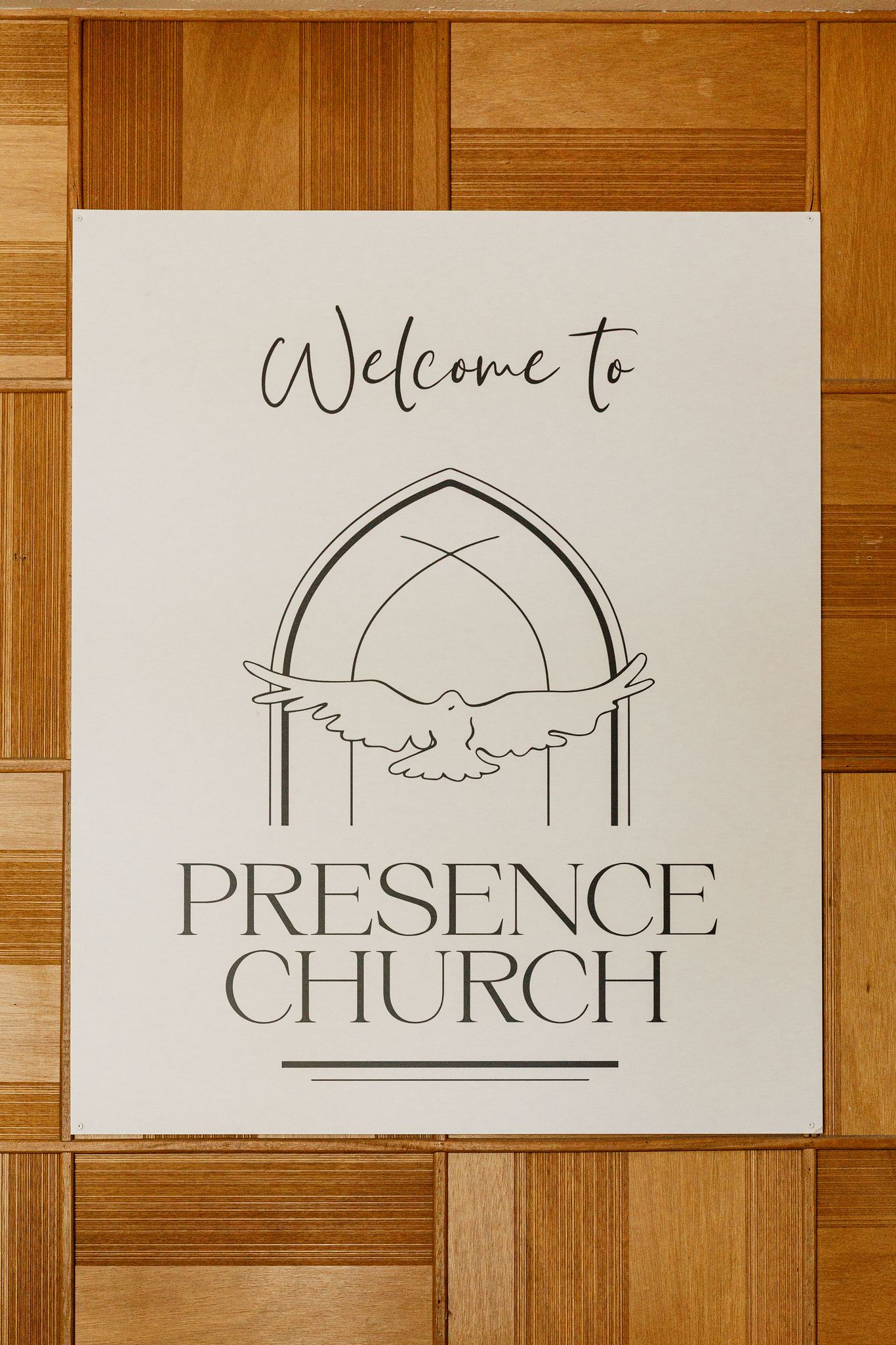 Church welcome sign hanging on the wall