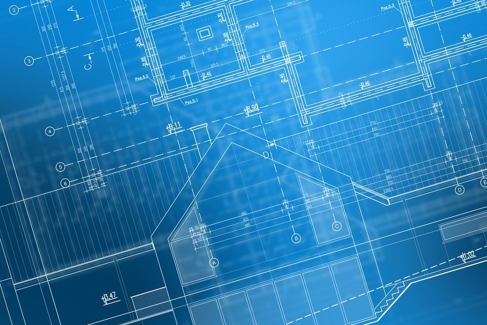 Architectural blueprints, white lines on blue background.